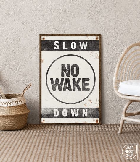 This retro-inspired "NO WAKE" sign is a unique addition to your lake house wall decor. The vintage lettering and distressed texture add effortless, relaxed style to your modern farmhouse decor. Available printed on canvas, paper, or aluminum, framed or unframed, these make wonderfully thoughtful gifts!  SIZES  Choice of 8" x 12", 12" x 18", 20" x 30", 24" x 36", or 32" x 48"  MATERIALS  CANVAS -- Printed on smooth, clay-coated canvas, and gallery-wrapped over a 3/4" deep wood frame. Can be displ Vintage Lakehouse Decor, Vintage Lake Decor, Lake Bathroom Decor, Vintage Lake House Decor, Lake House Aesthetic, Modern Lake House Decor, Lake House Wall Decor, Strand Decor, Vintage Cabin Decor