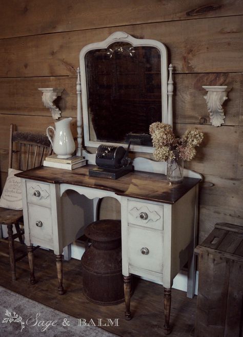 "THIS ITEM HAS SOLD ~ PORTFOLIO PIECE   Gorgeous & very rustic vintage vanity desk in pale grey with lovely character.  This handsome vanity desk is a unique gem that looks as though it was found at a flea market - with a tilt-mirror full of beautiful patina, worn & distressed solid maple top, and vintage, fluted-glass knobs, it is a great statement piece for the bedroom, office, or entry way!   FEATURES: - Pale grey is a warm colour and dark wax makes details pop - beautiful glass & brass knobs Refinished Vanity, Grey Vanity, Vanity Desk With Mirror, Desk With Mirror, Old Vanity, Vanity Makeover, Rustic Vanity, Painted Vanity, Mirrored Vanity Desk