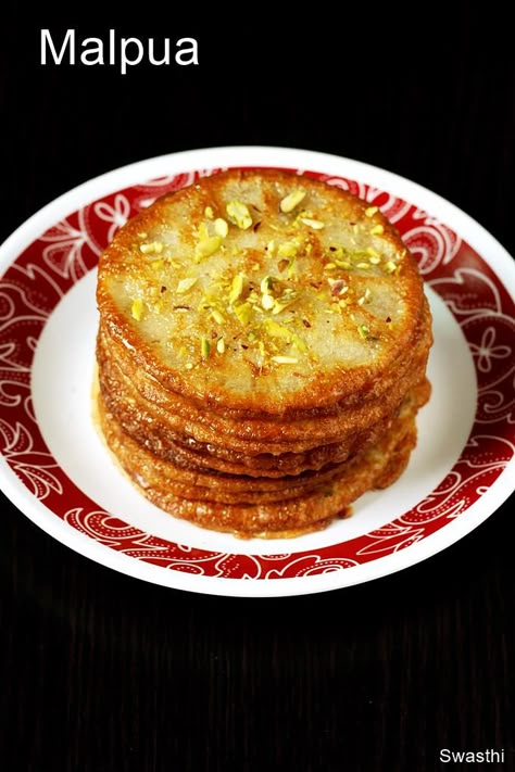 Malpua - Delicious Indian pancakes made for festivals like navratri diwali #recipe #malpua Rabdi Recipe, Dessert Aux Fruits, Indian Dessert Recipes, Tasty Vegetarian Recipes, Indian Snack Recipes, Indian Sweets, Indian Snacks, Indian Desserts, Indian Food Recipes Vegetarian