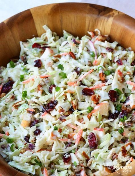 Take your coleslaw to a whole new level with sweet, tangy cranberries and crunchy pecans. Mix in an apple and some savory green onions then toss it all in a creamy dressing for a dish that's an amazing side for any gathering! Salad Coleslaw, Creamy Dressing, Buffalo Cauliflower, Cold Salad, Recipes Delicious, Slaw Recipes, Crunchy Pecans, Coleslaw Recipe, Homemade Snacks