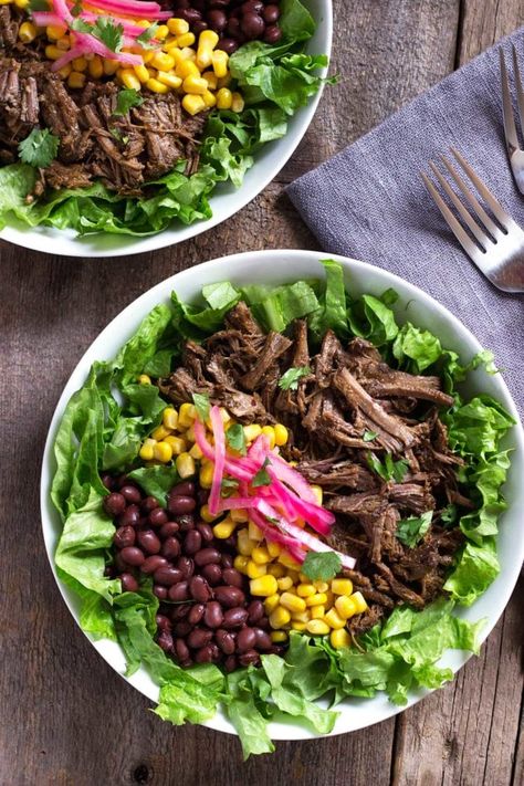 For Barbacoa Beef Bowls use beef simmered in chipotle, adobo, vinegar, citrus juice and spices, black beans, corn and pickled onions served on salad greens. Barbacoa Salad, Chipotle Adobo, Chipotle Copycat Recipes, Slow Cooker Barbacoa, Healthy Mexican Recipes, Grilled Corn Salad, Chicken Bowls, Beef Jerky Recipes, Teriyaki Beef