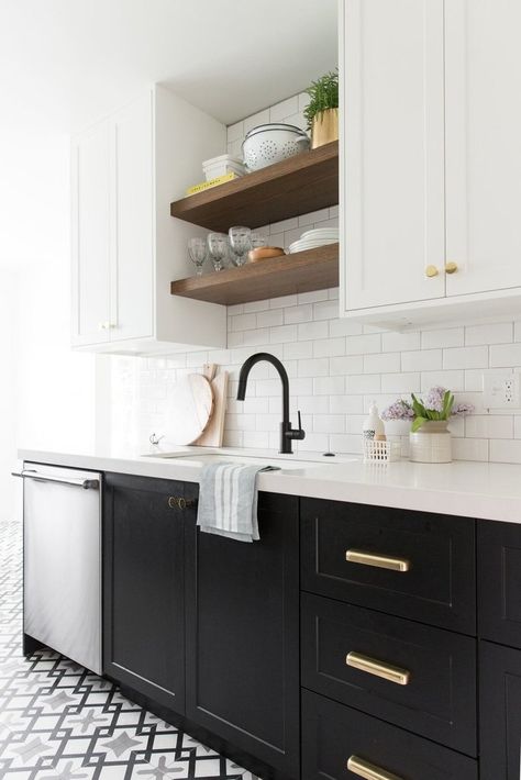 "Flush inset shaker cabinets are always a good idea. They look great painted, stained, and with every type of hardware," explained Shea McGee of Studio McGee. Shelves Above Sink, Above Sink, Black And White Kitchen, Kitchen Ikea, Open Kitchen Shelves, Classic Kitchen, Upper Cabinets, Black Cabinets, Kitchen On A Budget