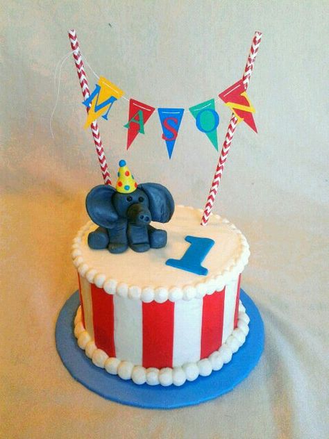 First birthday circus smash cake with super fun elephant and colorful banner! Carnival Smash Cake, Circus Smash Cake, Carnival Birthday Cakes, Circus First Birthday, Circus Cakes, Circus 1st Birthdays, Carnival Cakes, Carnival Birthday Party Theme, Circus Cake