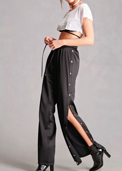 11 Pairs of Track Pants to Show Now | StyleCaster Sporty Wear, Snap Pants, Button Pants, Comfy Chic, Elie Saab, Dolce & Gabbana, Pants Outfit, Milan Fashion Week, Fashion Pants