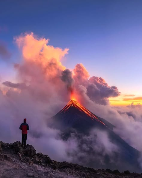 Volcano Fuego erupt alone on top of a mountain during a beautiful #sunset in Guatemala. 🌋🔥😍 Photo b On Top Of A Mountain, Top Of A Mountain, Pretty Places, Travel Inspo, Travel Insurance, The Clouds, Beautiful Sunset, Nature Travel, Travel Aesthetic