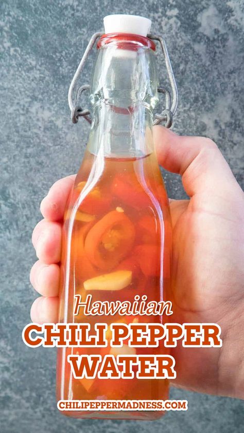 A bottle of the Hawaiian Chili Pepper Water in a bottle. Chili Water Recipe, Thai Hot Chili Pepper Recipes, Chili Pepper Water Recipe, Hawaiian Chili Pepper Water, Chili Pepper Water, Hawaiian Chili, Growing Hot Pepper, Chili Pepper Sauce, Chili Pepper Recipes