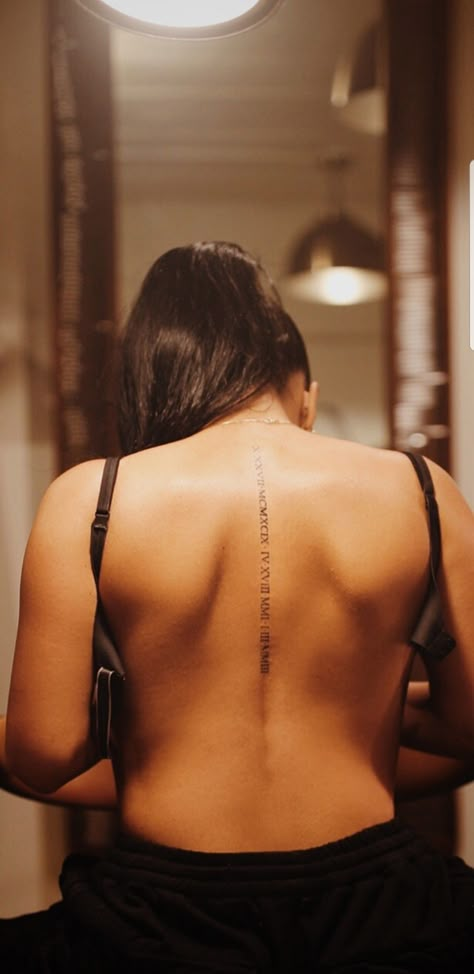 Vertical Back Tattoo For Women, Narrow Spine Tattoo, Coordinate Spine Tattoo, Letter Spine Tattoo, Number Spine Tattoo, Italian Spine Tattoo, Dates Down Spine Tattoo, Spine Tattoos For Women Roman Numerals, Name Spine Tattoo