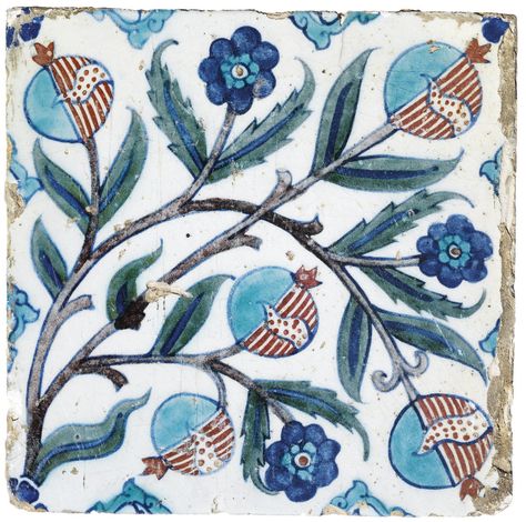 AN IZNIK POTTERY TILE OTTOMAN TURKISH,CIRCA 1640 The square tile with white ground painted in manganese, turquoise, cobalt-blue, bole-red and green with scrolling vine sprouting flowerheads, leaves and blue and red pomegranates, chips in the glaze, particularly around the edges Iznik Tile, Turkish Tile, Turkish Tiles, Turkish Ceramics, Antique Tiles, Red Pomegranate, Pottery Jug, Turkish Art, Square Tile