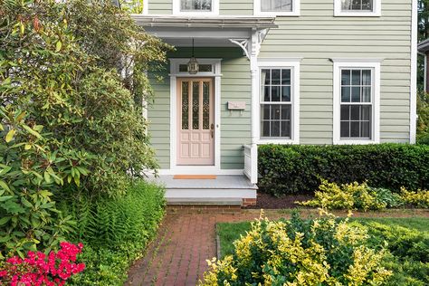 A Poconos House Renovation on a Shoestring Budget | domino Sage Green Colonial House Exterior, Green Colonial House, Green Colonial House Exterior, Colonial House Exterior, Mahogany Flooring, Shoestring Budget, Colonial House Exteriors, Window Nook, Shoji White