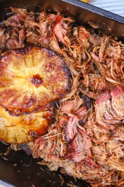 The next best thing to a whole hog roast, say aloha to this easy Hawaiian smoked pork shoulder. With an extra kick from our Notorious P.I.G., the pork is smoked then braised in our Big Kahuna #pineapple #teriyaki sauce. Shred and serve with rice or add to tacos, lettuce wraps and more.

#pulledpork #smokedpork #hawaiianpork #pineapple #pineapplepork #porkshoulder Recipe With Pineapple Juice, Pineapple Teriyaki Sauce, Pulled Pork Seasoning, Recipe With Pineapple, Hawaiian Pulled Pork, Hawaiian Pork, Pineapple Teriyaki, Hog Roast, Smoked Pork Shoulder