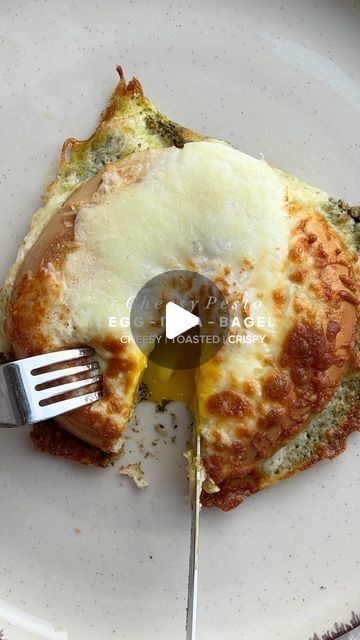 Erin Silberman on Instagram: "Air Fryer Cheesy Pesto Egg Bagel  •Follow @seriousfoodfetish for more recipes, restaurant recs & food trends•  This air fryer pesto bagel is going to be your new favorite breakfast… guaranteed! It’s so flavorful & it’s super easy to make. If you have ever had an egg in a hole, this takes it to a whole new level. This will change the way you eat your bagels from now on!  Ingredients (1 half of bagel) •2 T pesto •1 T evoo (extra virgin olive oil) •handful of mozzarella cheese •1 egg  •1 half of bagel   Recipe 1. Cut a piece of parchment paper that’s a little smaller than your air fryer basket.  2. Brush or spray evoo on center of parchment paper.  3. Spread pesto in shape of circle, about size of the bagel on top of the evoo.  4. Place bagel on pesto, cut side d Pesto Bagel, Egg Bagel, Pesto Eggs, Egg In A Hole, Pesto Cheese, Recipes Restaurant, Bagel Recipe, More Recipes, Food Trends