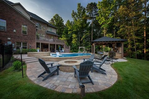 Pools With Retaining Walls Sloped Backyard, Radiant Pools, Latham Pool, Sunken Fire Pits, Sloped Yard, Modern Fire Pit, Sloped Backyard, Rectangular Pool, Pool Installation