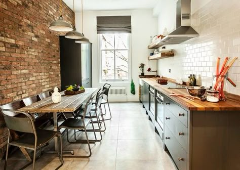 Long, narrow dining table for a galley kitchen. It can be pushed against wall when not in use & even better with bench seating on the wall side. Industrial Interior Kitchen, Narrow Dining Tables, Long Narrow Kitchen, Modern Industrial Kitchen, Industrial Kitchen Design, Loft Kitchen, Galley Kitchens, Industrial Style Kitchen, Narrow Kitchen