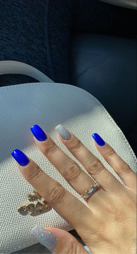 Nails For A Royal Blue Prom Dress, Royal Blue Nails With Silver Glitter, Royal Blue Nails With Accent Nail, Royal Blue And Glitter Nails, Royal Blue Acrylic Nails With Silver, Cute Royal Blue Nails For Prom, Cute Acrylic Nail Designs Purple, Pretty Royal Blue Nails, Homecoming Nails Blue Dress