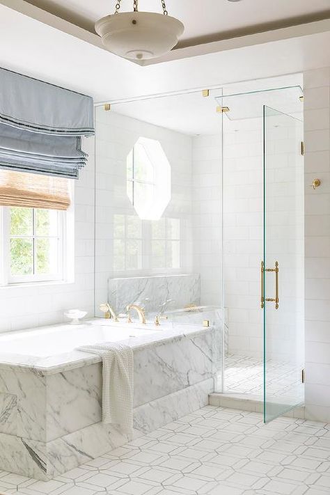 Marble Clad Bathtub with Brass Tub Filler - Transitional - Bathroom Undermount Tub, Master Remodel, Bathroom 2024, Black Floor Tiles, Bright Bathroom, Timeless Architecture, Shower Area, Geometric Floor, Condo Remodel