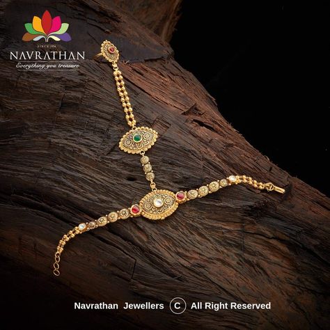 http://navrathan.com/  Your envy-inducing ensembles deserve attention with stunning #jewellery from Navrathan Jewellers. This traditional Haath Phool – A bridal kundan gold ring linked to a bracelet encrusted with precious stones is made using the finest techniques. At Navrathan Jewellers you’ll find fine jewellery reminiscent of a bygone era. Walk into #Navrathan Jewellers today and get your hands on them.  #navrathan #jewellers #jewellery Hathful Designs Gold, Haath Phool Jewellery Gold, Gold Hand Bracelet With Ring, Navrathan Jewellers, Haath Phool, Beads Craft Jewelry, Antique Jewellery Designs, Gold Mangalsutra Designs, Gold Jewelry Simple Necklace