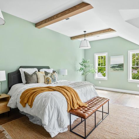 If Spring was a bedroom 🌱✨ we chose this fresh sage green wall color which contrasts so beautifully with the stained wood ceiling beams. The natural light in here is a dream, and even better… there’s a mini bar! Who wouldn’t want a primary suite with a wine fridge?! Project: Nature-Inspired New Home Tour Paint color: @benjaminmoore Misted Green 2138-50 #primarybedroom #greenwalls #greenbedroom #masterbedroom Sage Green Wall Color, Misted Green, Stained Wood Ceiling, Wood Ceiling Beams, Green And White Bedroom, Green Wall Color, Bold Bedroom, Bedroom Turquoise, Sage Green Wall