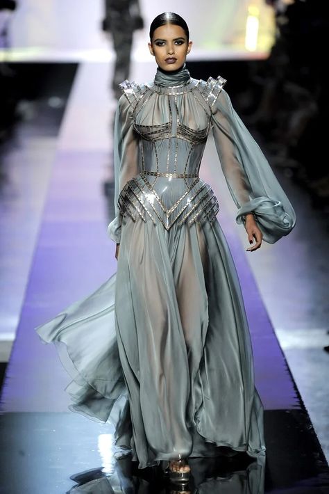 Jean Paul Gaultier Fall 2009 Couture Collection - Vogue - light blue sheer gown with bishop sleeves and transparent structured corset with copper-colored trim Haute Couture Style, Jean Paul Gaultier Haute Couture, Collection Couture, Couture Mode, Haute Couture Fashion, Mode Inspo, 여자 패션, Paul Gaultier, Fashion Show Collection