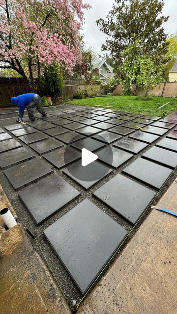 Paving With Stones, Black Pavers Backyard, Paving Front Of House, 24”x24” Paver Patio, Inexpensive Backyard Patio Ideas, Cement Paver Patio Ideas, Outside Pavers Ideas, Rock And Paver Patio Ideas, Stone Yard Landscaping