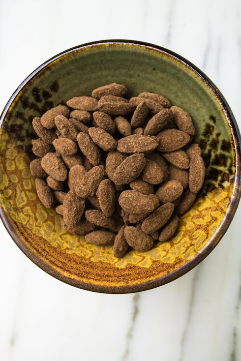 cocoa roasted almonds  | toot sweet Cocoa Roasted Almonds, Cocoa Dusted Almonds, Almonds Recipe Healthy, Roasted Almonds Recipe, Homemade Cocoa, Cleaning Baking Sheets, Roasted Almond, Travel Snacks, Chocolate Company