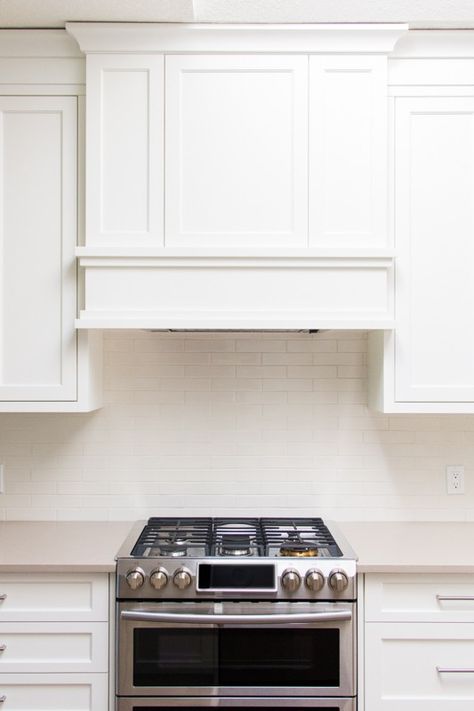 Shaker Cabinets Kitchen White Range Hoods, Cabinet Over Stove Vent Hood, White Hood Ranges Kitchen, Kitchen Range Hood Ideas Shaker Style, Kitchen Hoodfan Ideas, Simple Oven Hood Ideas, Range Hood With Art, Hidden Exhaust Hood Kitchen, Cabinet Over Range