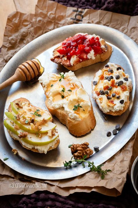 Sweet ricotta crostini is an irresistible sweet treat ready in a blink of an eye. Imagine creamy bed of velvety ricotta cheese topped with sweet fruity topping all served atop a crisp toasted baguette slice. Simply divine! In the recipe you'll find 4 delicious crostini toppings that are super simple and easy to make. Napoleon Pastry, Summer Feast, Crostini Toppings, Sweet Ricotta, Ricotta Crostini, Holiday Cheese Boards, Toasted Baguette, European Recipes, Summer Brunch