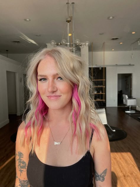 Blonde hair with pink peekaboos and beachy waves Blonde Hair With Strip Of Color, Pink Strip In Blonde Hair, Blonde Hair Color Ideas With Peekaboos, Medium Length Blonde Hair With Pink, Blondes With Pink Highlights, How To Do Pink Highlights In Blonde Hair, Pop Of Color Hair Placement, Pink Peekaboo On Blonde Hair, Colors To Dye Your Hair Blonde