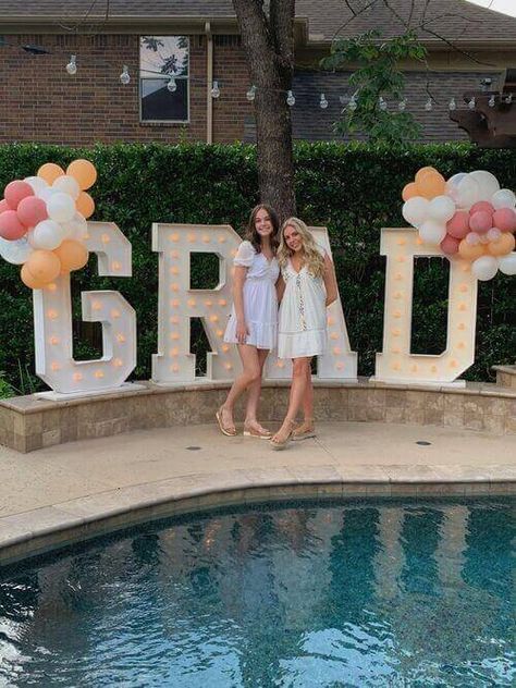 24 Best Graduation Party Ideas In 2023 (For An Epic Night) Pink Graduation Party, Grad Party Theme, Graduation Party Pictures, College Grad Party, Backyard Graduation Party, Graduation Photo Booth, Outdoor Graduation Parties, Outdoor Graduation, Senior Graduation Party