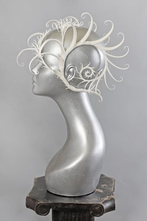 This is a one of a kind piece of wearable art made for the Five and Diamond Sixth Annual Headgear Art Show and shown on August 2, 2018. Kharybdis (mythological sea monster/whirlpool) Middle section is sculpted from flexible spring steel, snugly wrapping around the wearer, a perfect fit for all sizes. This piece is reversible, either open side can be the correct direction. It has two flexible spines on one of the open sides to secure the piece if you are wearing it in that style. Designed and han Headpieces Art, Sculptural Fashion Wearable Art, Headgears For Fashion Show, Art Headpiece, Sea Monster Costume, Head Gears For Fashion Show, Luxury Fantasy Costume Headpieces, Paper Headpiece, Disguise Art