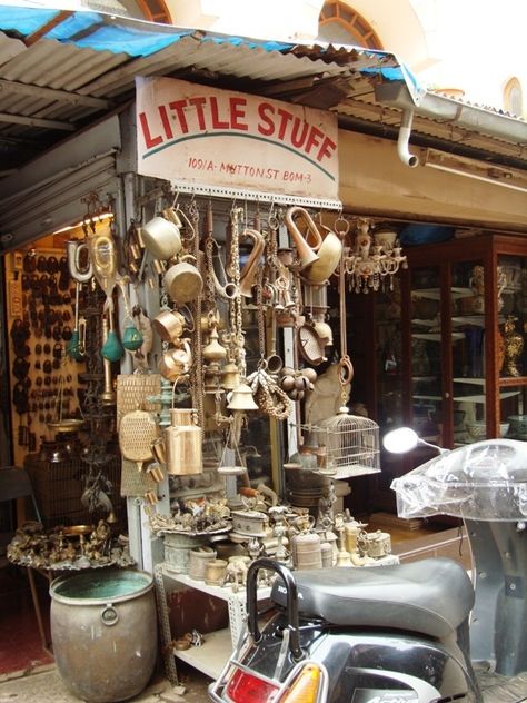 Little Stuff - one of my favourite shops in Mutton Street, Chor Bazaar. They have brass kettles, brass tiffins, old measure weights, and several other interesting things. Chor Bazaar, Hindu Statues, V60 Coffee, My Favourite, Mumbai, India, Brass