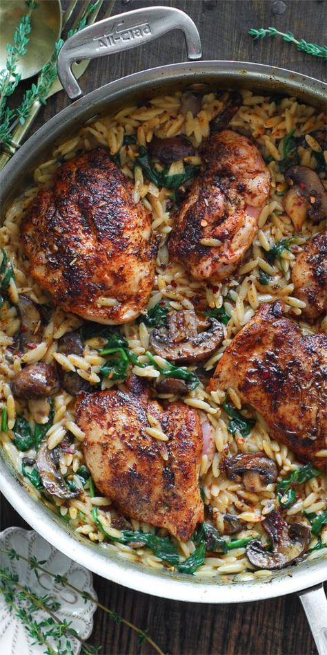 ONE-POT Creamy Chicken Orzo with Spinach and Mushrooms. It's a 30-minute one-pan well-balanced weeknight meal that has everything: protein, veggies, and pasta! Skinless boneless chicken thighs are pan-seared with paprika and Italian seasoning. It's the perfect comfort food that will surely become one of your family's favorite dinners! Orzo With Mushrooms, Creamy Chicken Orzo, Orzo With Spinach, Orzo Spinach, Orzo Pasta Recipes, Simple Spinach Salad, Spinach And Mushrooms, Mushrooms And Spinach, Protein Veggies