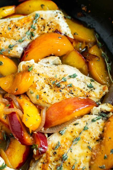 Bourbon peach chicken is a vibrant, colorful summer dish that pairs savory browned chicken with tart juicy peaches and a sweet bourbon pan sauce. This dish only requires one pan and a few simple ingredients, making cooking and cleanup a cinch. And did we mention it comes together in just 30 minutes? Pair it with your favorite side salad, cooked grains, or pasta salad to round out this dish. #peachchicken #peachrecipes #chickenrecipes #chicken #healthychicken #easydinner #summerrecipes Chicken And Pears Recipes, Chicken With Peaches Recipes, Peach Chicken Recipes, Peach Bourbon Chicken, Chicken And Peaches Recipe, Peach Chicken Salad, Chicken And Peaches, Burbon Chicken, Peach Chicken