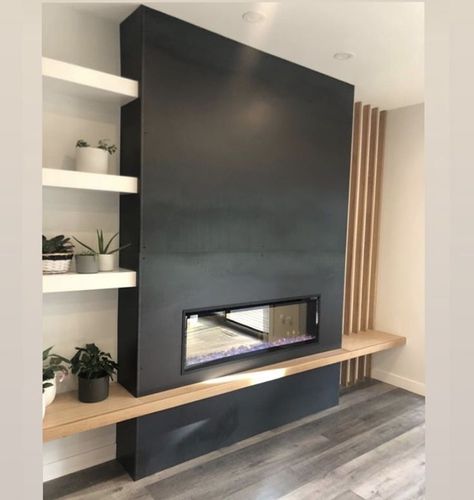 Modern Black Fireplace With Built Ins, Modern Fireplace Black Marble, Black Steel Fireplace Wall, Fireplace Tv Wall Minimalist, Entry Alcove Ideas Foyers, Modern Area Rugs Living Room, Linear Fireplace With Floating Hearth, 72 Inch Tv On Wall, Modern Built In Fireplace And Tv