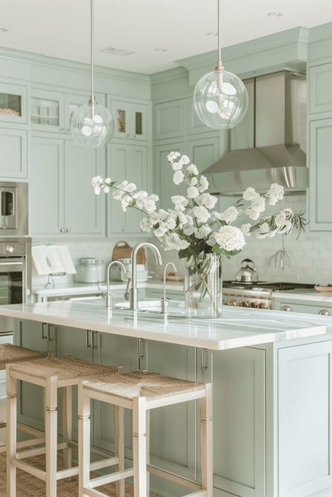 Imagine waking up to a kitchen filled with the soothing color of light green cabinets. This soft hue adds a touch of nature and makes the space feel open and inviting. Combine it with brass handles for a chic look or keep it simple with neutral accents. It’s a color that effortlessly elevates your kitchen’s style! #kitchengoals #greenkitchenideas #cabinettrends Green Kitchen Cabinet Colors, Light Green Cabinets, Pastel Green Kitchen, Green Cottage Kitchen, Green Kitchen Cabinet, Light Green Kitchen, Mint Green Kitchen, Mint Kitchen, Cabinet Trends