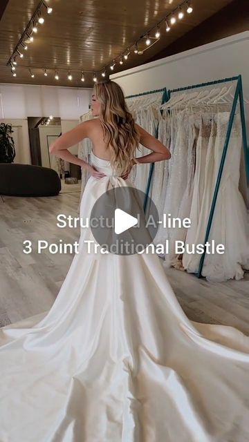 Alta Moda Bridal - Utah Bridal Shop on Instagram: "Wedding dress bustle ideas! 👉🏽 Which silhouettes do you want us to do next?  . . . . . #bridalreels #weddingreels #sayyestothedress #weddingdressbustle #utahbridalshop #utahbridals #utahweddings #utahbrides #syttd #bridalalterations #utahbridal" Satin Dress Bustle, How To Make A Bustle On A Wedding Dress, Bustle Options Wedding Dresses, Different Bustle Styles, Bustle Types Wedding Dress, Aline Wedding Dress Bustle, A Line Bustle, Side Bustle Wedding Dress, Wedding Dresses For 2024