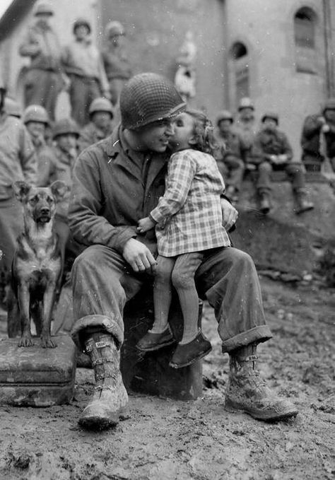 9th Armored Division technician with a little French girl on Valentine’s Day, 14 Feb 1945 - Imgur Vintage Foto's, Nagasaki, Old Photographs, American Soldiers, Photo Vintage, Muhammad Ali, White Photo, Vintage Pictures, Vintage Photographs