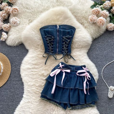 The Petite Denim Outfit Set, complete with a stylish corset and matching skirt, is designed for those who want to embrace a touch of chic and sophistication in their fashion. This set is perfect for individuals who appreciate elegant and stylish designs that accentuate their petite frame while making a lasting style statement.