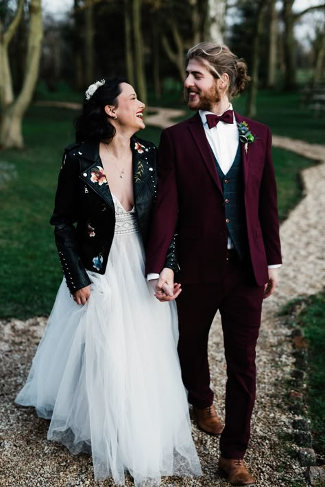 Groom in Burgundy Wedding Suit and Bride in Leather Jacket for Winter Wedding Black And Burgundy Suit, Groom In Burgundy, Burgundy Wedding Suit, Burgundy Suit Wedding, Alternative Groom, Fall Wedding Suits, Crazy Bear, Jacket For Winter, Groomsmen Outfits