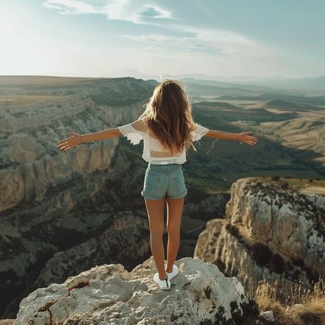 Freedom on Heights: A young woman stands with arms wide open, embracing the vast, breathtaking landscape from atop a rocky summit. #freedom #woman #cliff #landscape #nature #aiart #aiphoto #stockcake ⬇️ Download and 📝 Prompt 👉 https://ayr.app/l/VBca Freedom Photoshoot, Open Arms, Standing Poses, Woman Standing, Senior Pictures, Free Stock Photos, Photo Poses, How To Take Photos, Royalty Free Images