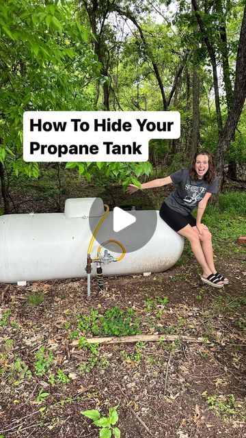 maggie mcgaugh on Instagram: "Propane tank gets camouflaged! 😏  If it weren’t for @ferrellgas , I’d still be stuck on hold trying to reach someone who services my area. 😂  #ad Ferrellgas made my life easier, and with my saved time and a little hard work, I got this beautiful view.   Click the link in my bio to get a propane price quote from Ferrellgas.   #FuelLifeSimply #Ferrellgas #propanetankmakeover #frontyardmakecover #yardmakeover" Covering Propane Tank Ideas, Hiding Propane Tank, Propane Tank Art Ideas, Hide Propane Tank Ideas, Propane Tank Hide, Painted Propane Tanks Ideas, Propane Tank Landscaping Ideas, Hidden Propane Tank Ideas, Hide A Propane Tank