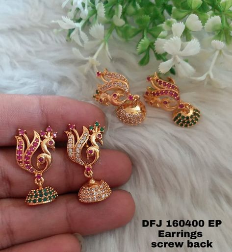 Stunning one gram gold earrings in dancing peacock design. Earrings studded with multi color stones. 10 October 2019 One Gram Gold Earrings, Dancing Peacock, Gold Earrings Indian, Bridal Jewellery Inspiration, Gold Jhumka Earrings, Gold Pearl Jewelry, 10 October, Gold Jewelry Outfits, Gold Mangalsutra Designs