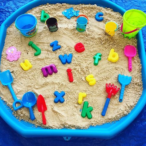 Sand tuff tray letters and numbers Sand Pit Activities, Sand Play Eyfs, Sand Tuff Tray Ideas, Sand Tray Ideas, Summer Tuff Tray Ideas, Seaside Eyfs, Sand Tray Ideas Eyfs, Water Tray Ideas Eyfs, Beach Theme Preschool