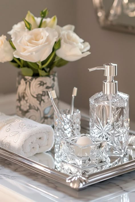 Bathroom Decor Ideas Silver Faucet, Pretty Bathrooms Aesthetic, Bath Vanity Decor Ideas, Glam Bathroom Decor Luxury, Silver Bathroom Decor Ideas, Bathroom Tray Styling, Bathroom Vanity Tray Ideas, Tiny Bathroom Decor Ideas, Silver Trays Decor Ideas