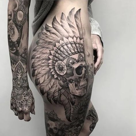 Skull Tattoos Thigh, Thigh And Bum Tattoo Women, Hip Tats, Bum Tattoo Women, Tattoos Thigh, Side Tat, Indian Skull Tattoos, Headdress Tattoo, Skull Tattoo Flowers