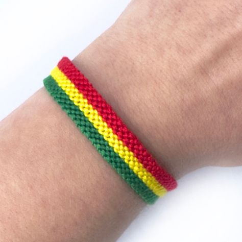 Congo flag bracelet, reggae colors red yellow green, Bolivia flag, Mali flag, Benin flag, Guinea Flag, Ethiopia symbol by SomePatience on Etsy Reggae Colors, Benin Flag, Mali Flag, One Braid, Bolivia Flag, Congo Flag, Flag Bracelet, Cotton Embroidery, Handmade Bracelet