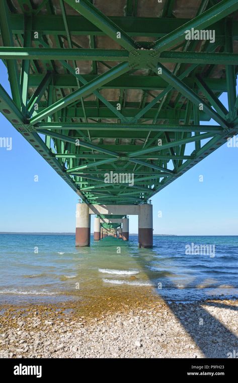 Download this stock image: A view of the underneath of the Mackinac Bridge in Mackinaw City, Michigan looking north from the lower peninsula to the upper peninsula. - P9FH23 from Alamy's library of millions of high resolution stock photos, illustrations and vectors. Mackinaw Bridge, Mackinaw City, Mackinac Bridge, Upper Peninsula, Amazing Architecture, Michigan, Photo Image, High Resolution, Bridge