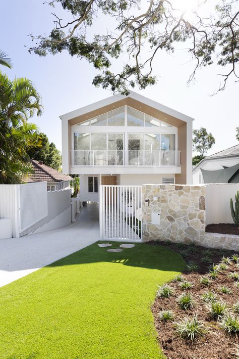 Glass and gabled facade of home | Scandi-Med home tour Coastal House Exterior, Coastal Facade, Dulux Natural White, Coastal Exterior, House Architecture Styles, Front Fence, Beach House Exterior, Modern Coastal, Facade House