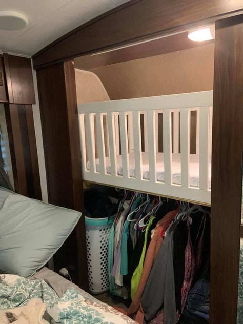 Toy Hauler Nursery, Rv Play Area, Rv Sleeping Ideas, Rv Toddler Bed Ideas, Crib In Rv, Camper Living With Newborn, Nursery In A Camper, Camper Crib Ideas, Crib In Camper