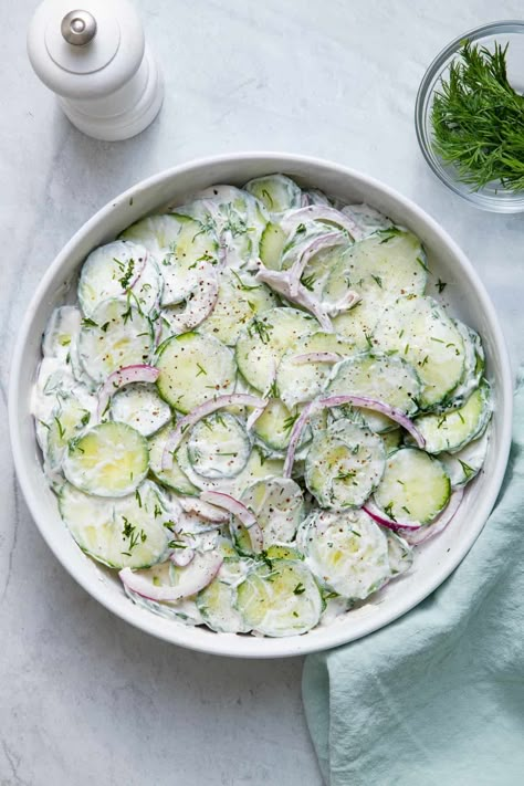 Creamy cucumber salad made with fresh dill, sour cream, and onions! This summer salad is ready in 5 minutes and is perfect for BBQs and picnics! | Creamy Cucumber Salad | Sour Cream Cucumber Salad | Cucumber salad with onions | Summer Salad Recipes | BBQ Side Dish | Cucumber Salad Sour Cream, Cucumber Sour Cream, Sour Cream Salad, Creamed Cucumber Salad, Salad With Sour Cream, Easy Cucumber Salad, Cucumber Dill Salad, Salad Art, Feel Good Foodie