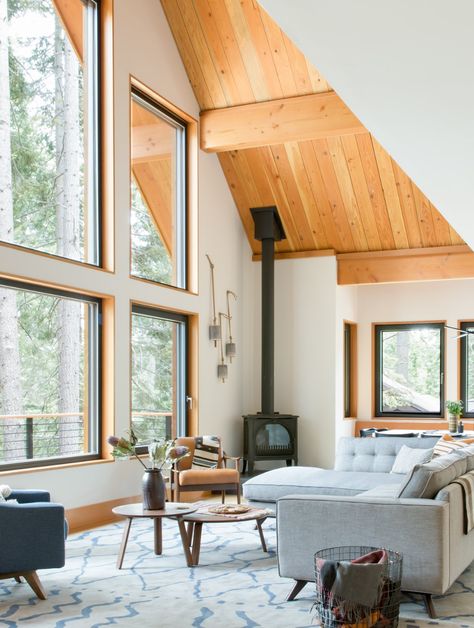 Photo 2 of 5 in How Much Should You Spend on a Living Room Sofa? from Woodsy Tahoe Cabin - Dwell Tahoe Cabin, Cabin Living Room, Cabin Interiors, Cabin Living, Corner Fireplace, A Frame Cabin, A Frame House, Modern Cabin, Rustic Living